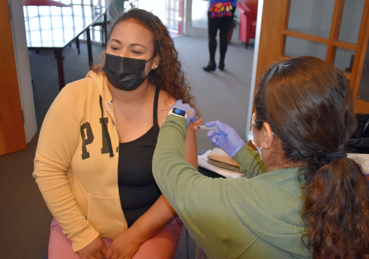 Maria Haro recieves the COVID-19 Moderna vaccine
